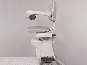 Bruno Elite straight indoor stairlift power swivel seat rotated at top of stairs