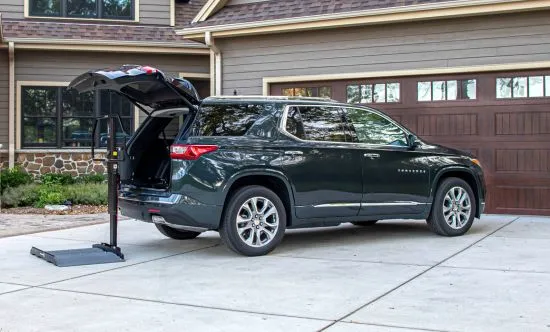 scooter lift setup in the back of a midsize SUV
