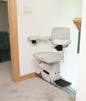 Elite straight indoor stair lift turned 90 degrees at top of stairs